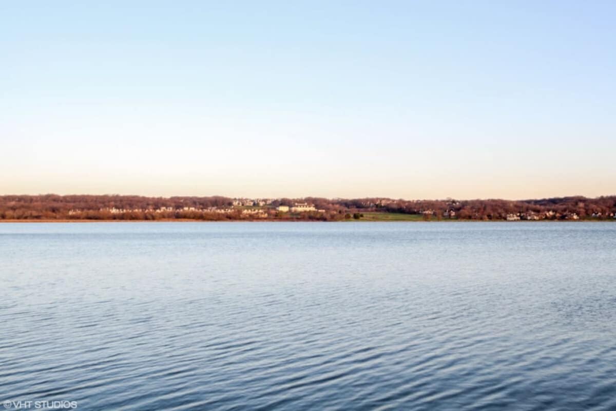 Lake Geneva vacation rental guests enjoy sunset views over Lake Como in the fall